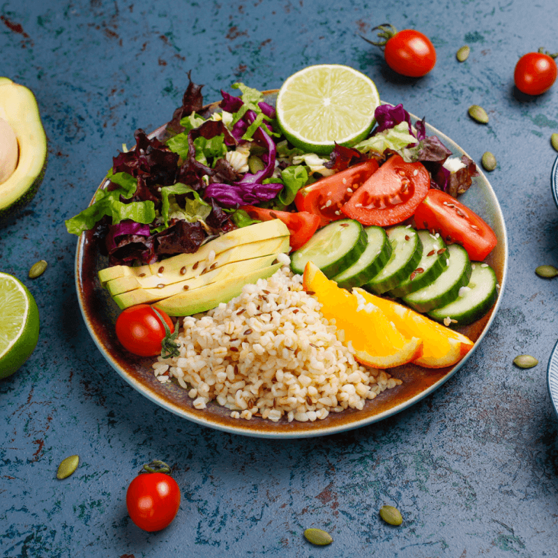 Healthy Ayurvedic diet with balanced meals, fresh fruits, vegetables, and herbs for overall wellness.