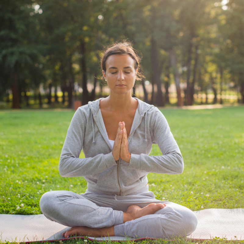 Traditional yoga session at Ayur Wakeup Kerala for improving flexibility, balance, and inner peace.